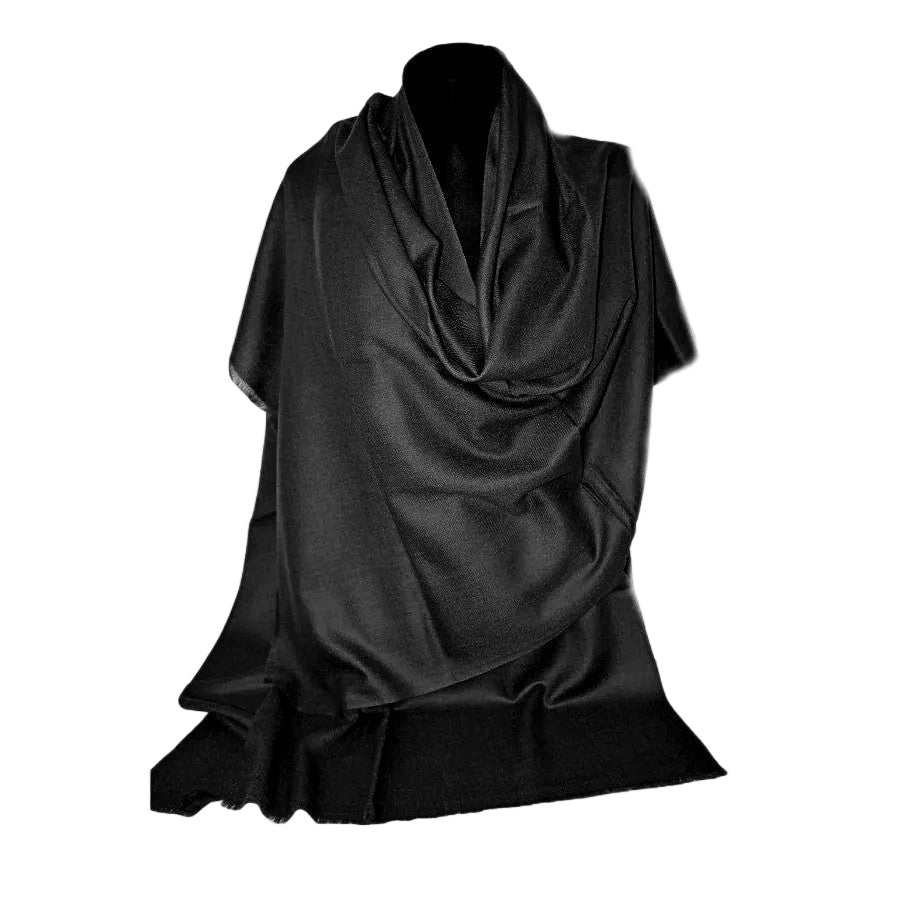 Black scarf draped over a mannequin on a white background