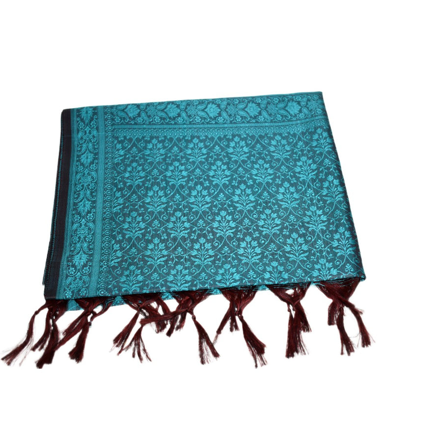 Teal patterned scarf with tassels on a white background