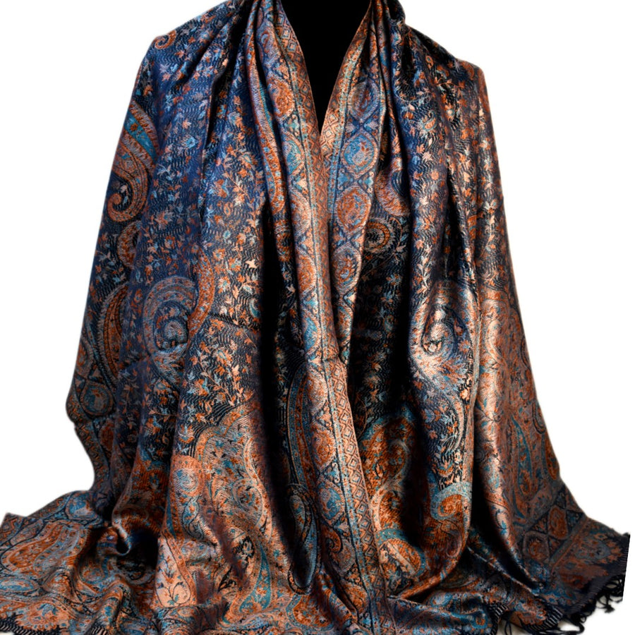 Patterned scarf with blue and brown tones on a white background