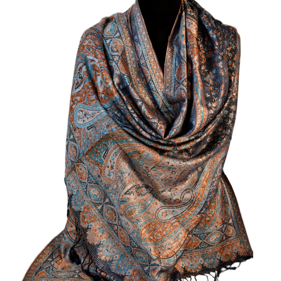 Patterned scarf with brown and blue tones on a white background