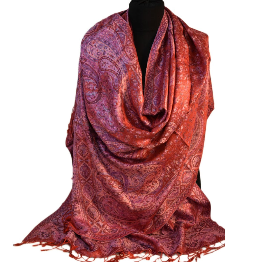 Red pure silk scarf on a mannequin against a white background