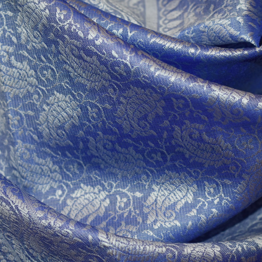 Close-up of blue and silver patterned fabric