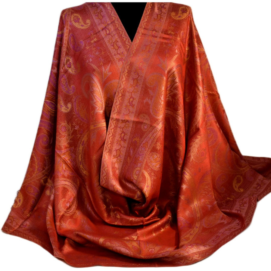 Red pure silk scarf over a black mannequin on a white background