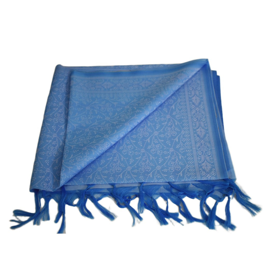 Blue scarf with intricate patterns and fringes on a white background