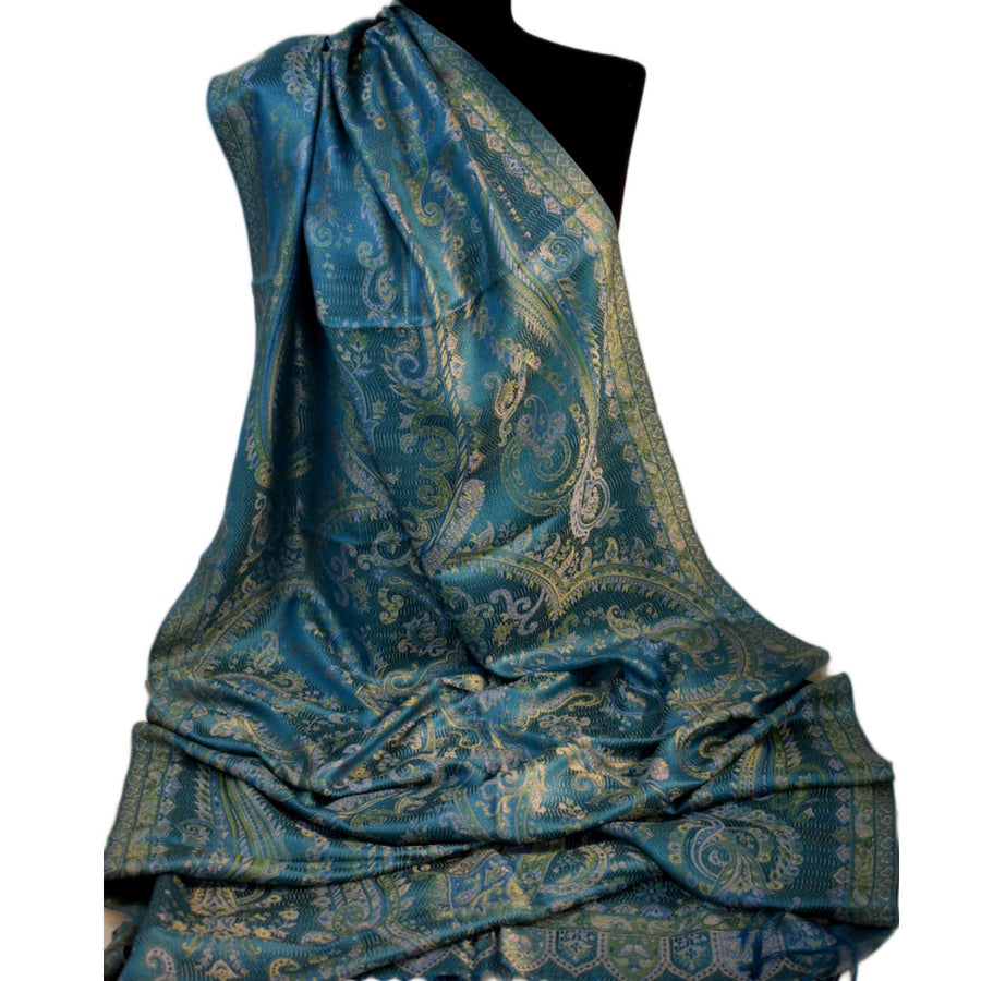 pure silk Blue paisley patterned draped over a mannequin on a white background