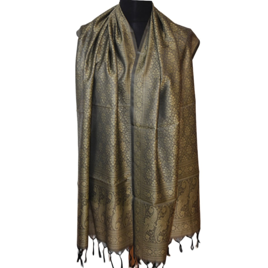 Patterned scarf with tassels on a mannequin against a white background