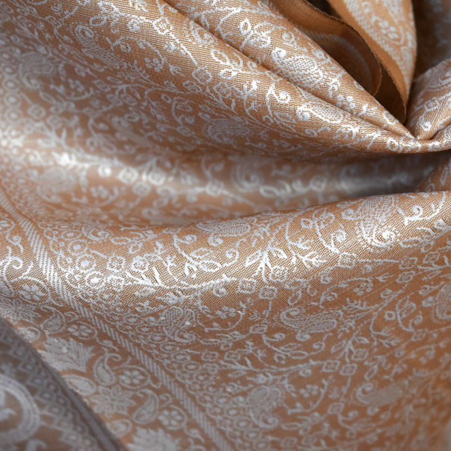 Close-up of patterned fabric with intricate design