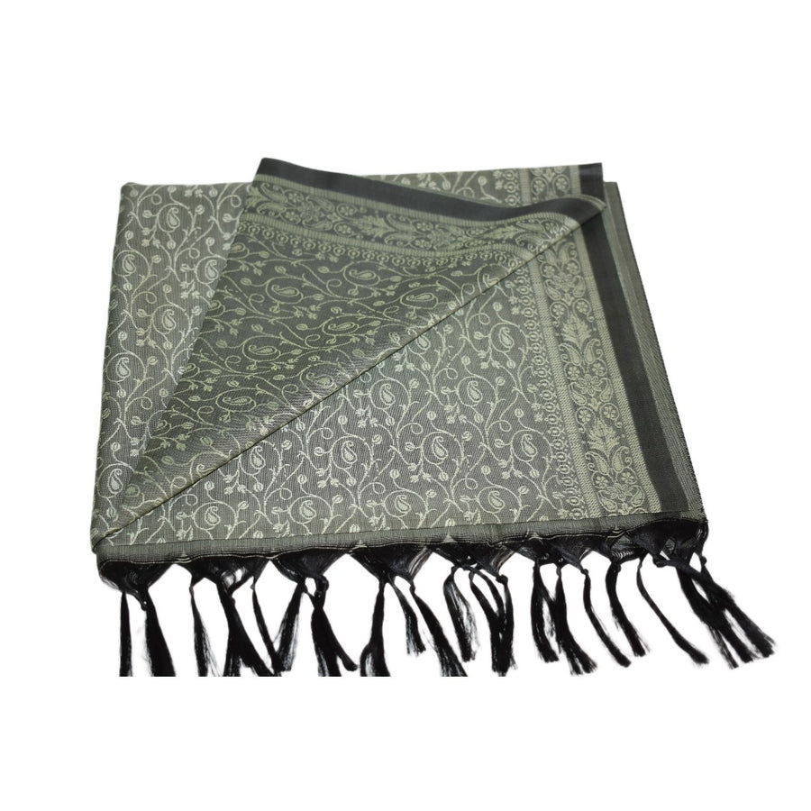 Green patterned scarf with black edges and fringes on a white background