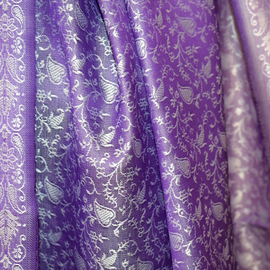 Purple fabric with white floral pattern