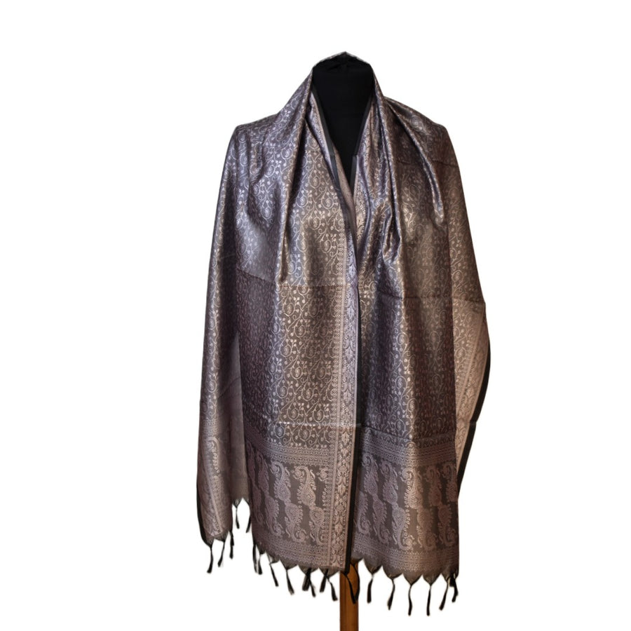 Patterned scarf with tassels on a white background