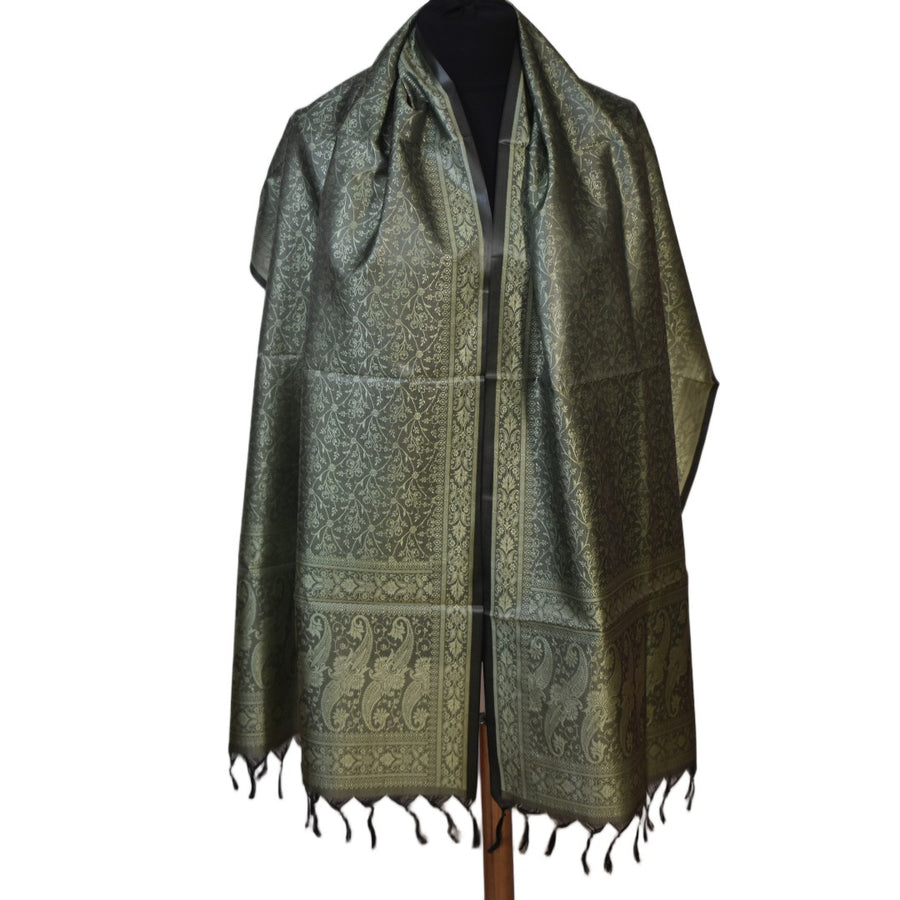 Green patterned scarf with tassels on a white background